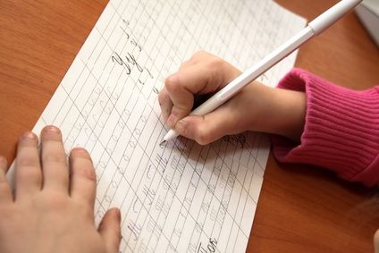 Child practicing cursive writing
